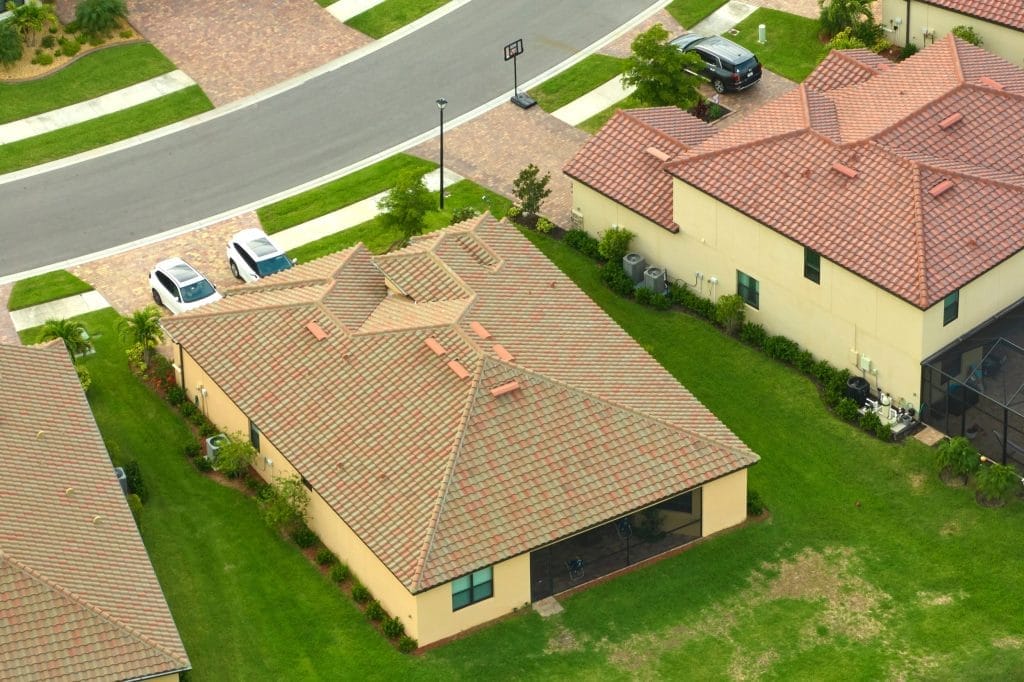 Professional roofing contractor repairing roof damage New Smyrna Beach FL