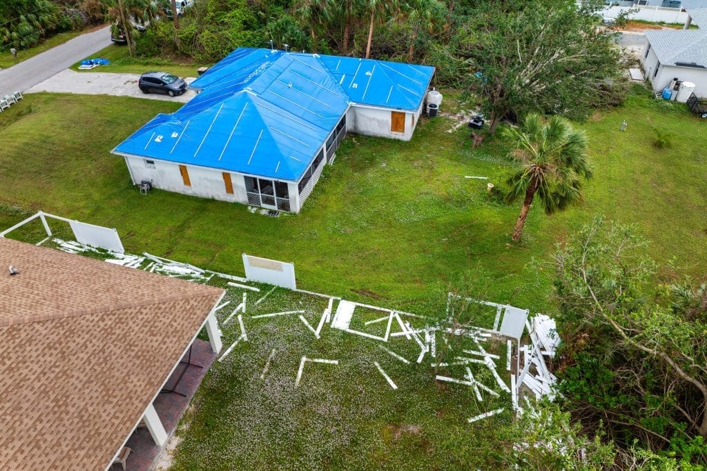 Daytona Beach Roofing contractor repairing residential roof in Ormond Beach FL