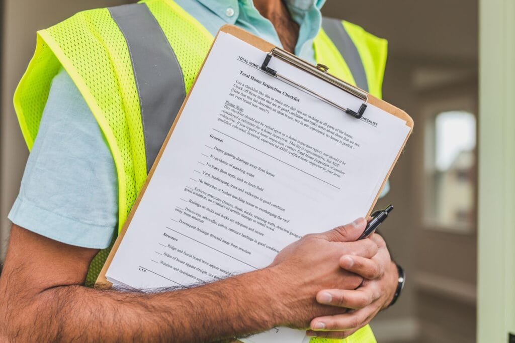 Home inspector with checklist